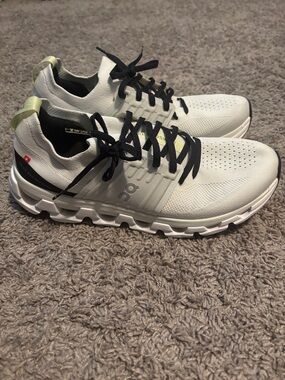 On Cloudrunning Sneakers in White with Black and Yellow Accents